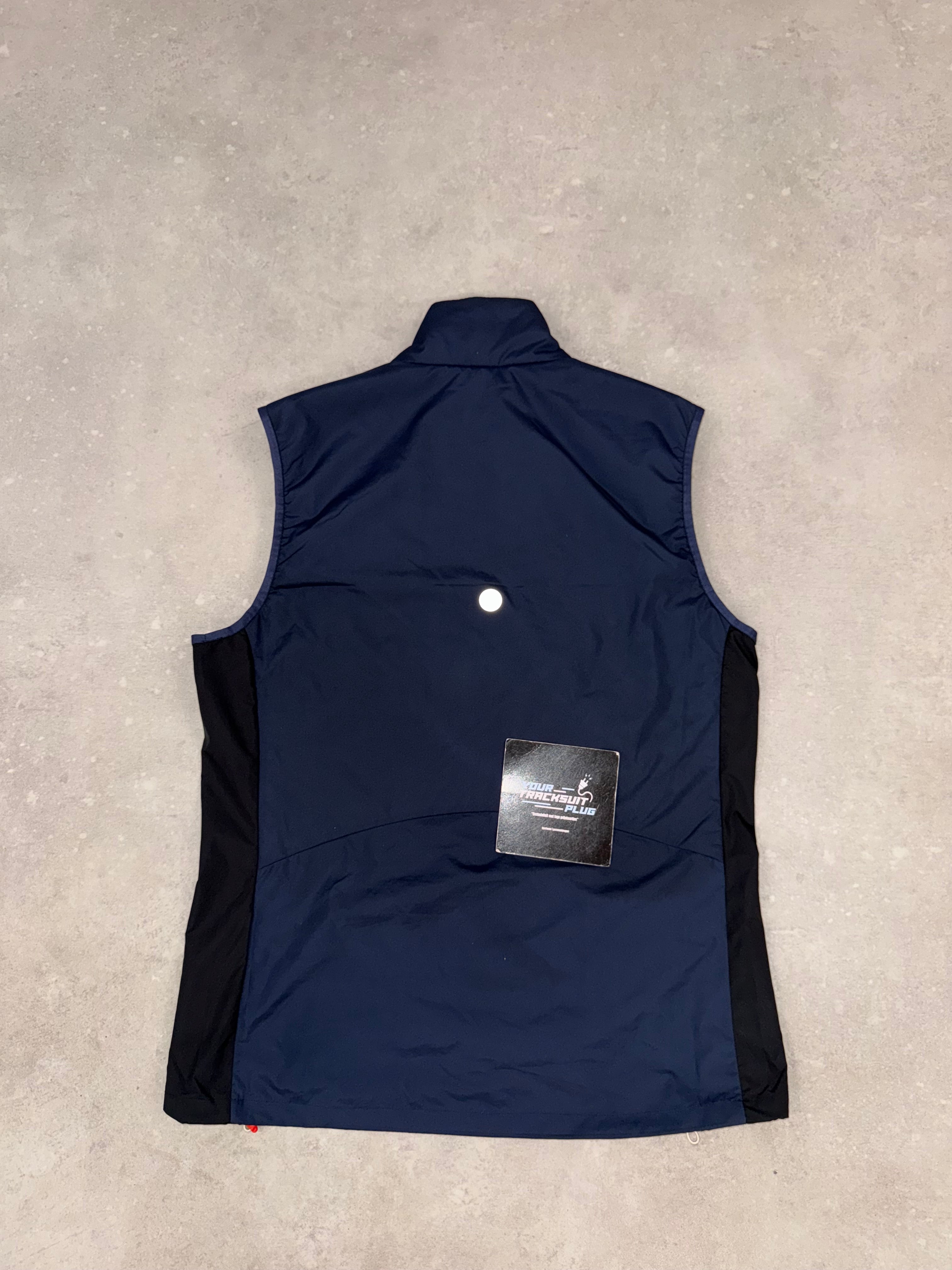 ASICS BODYWARMER BLUE // THE LATEST