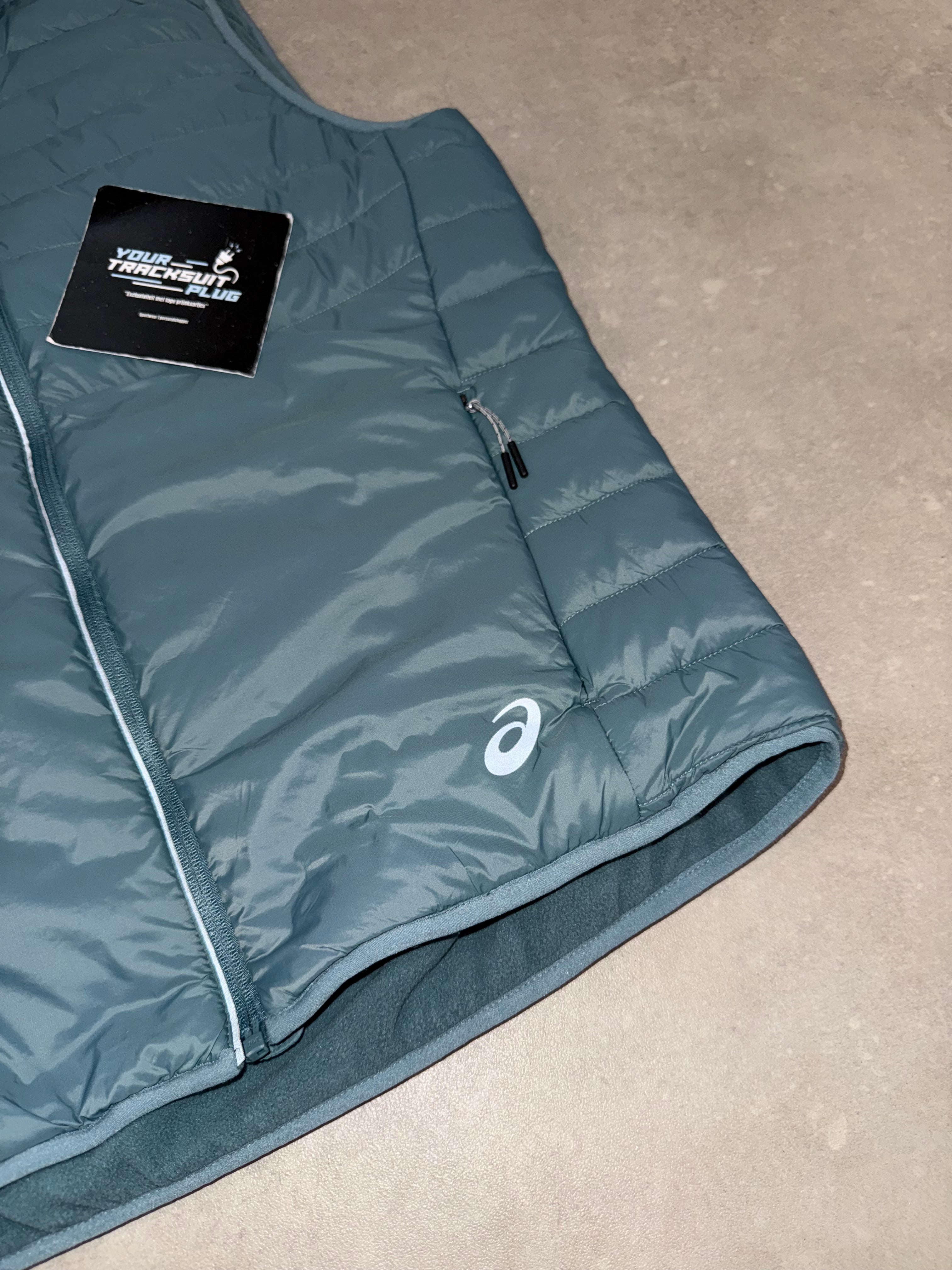 ASICS BODYWARMER // MOST EXCLUSIVE